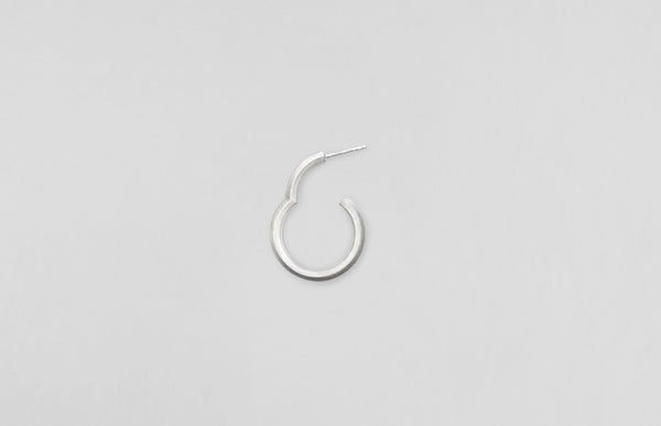 Handcrafted sustainable jewellery by Makiami made in Stockholm. A & shape sterling silver earring.
