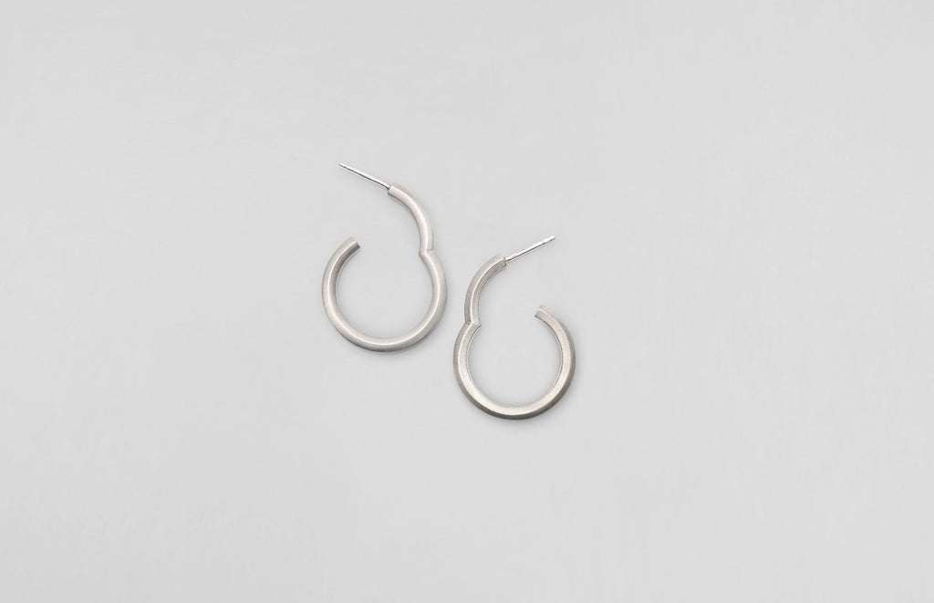 Handcrafted sustainable jewellery by Makiami made in Stockholm. A & shape sterling silver earring.